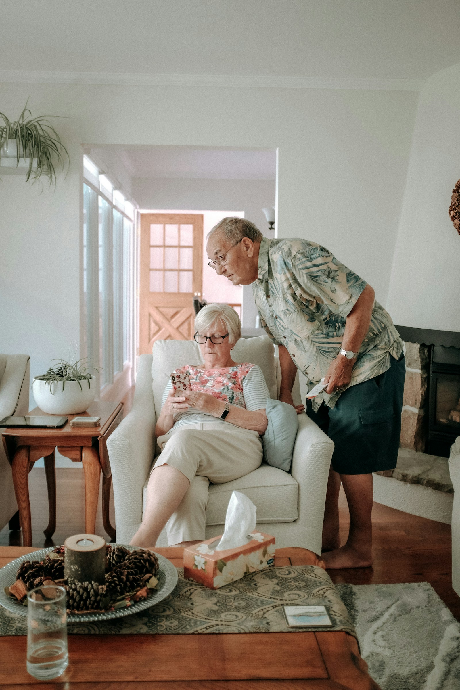 Two adults sitting together at home