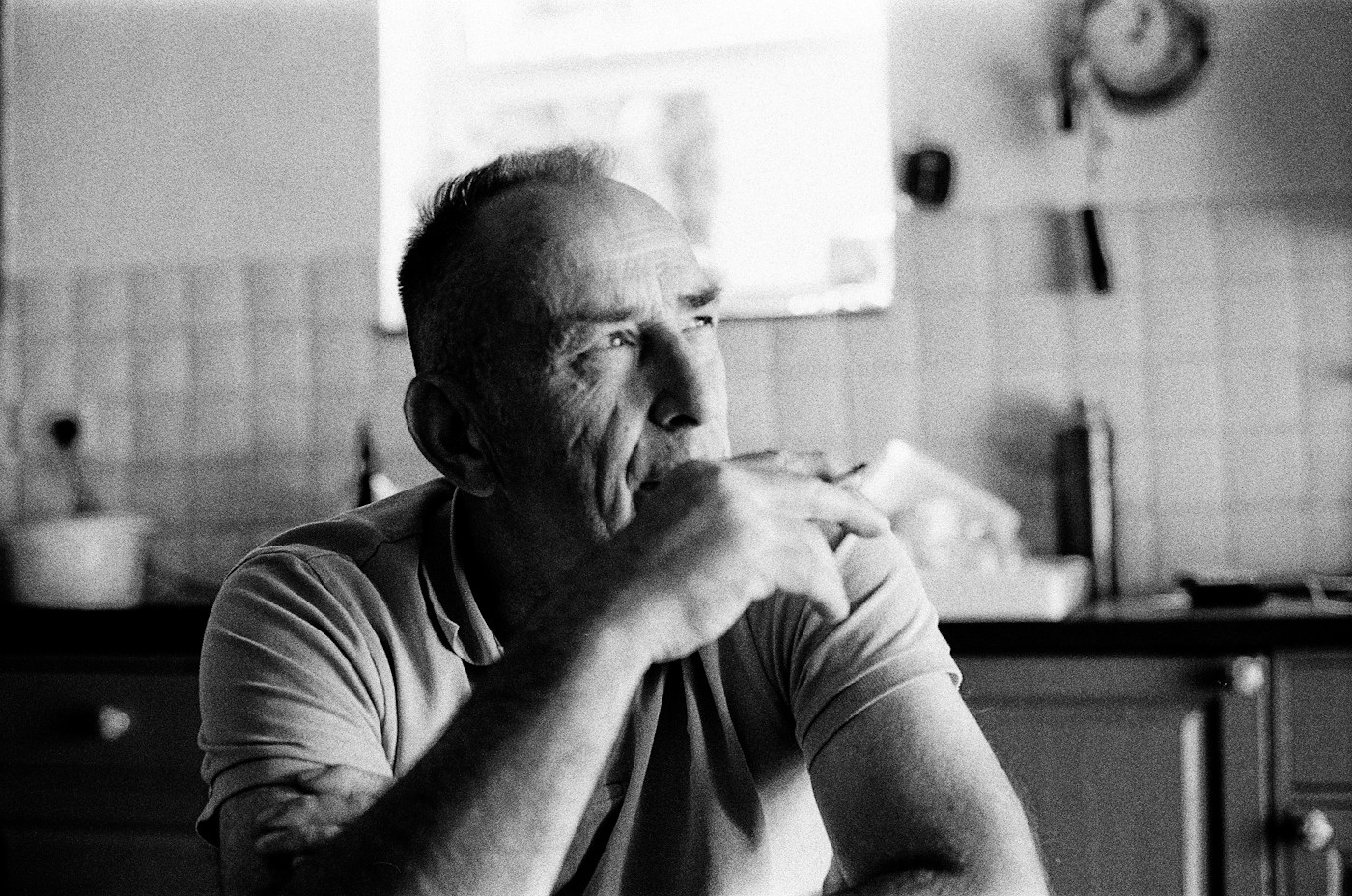 Older adult in a quiet moment at home